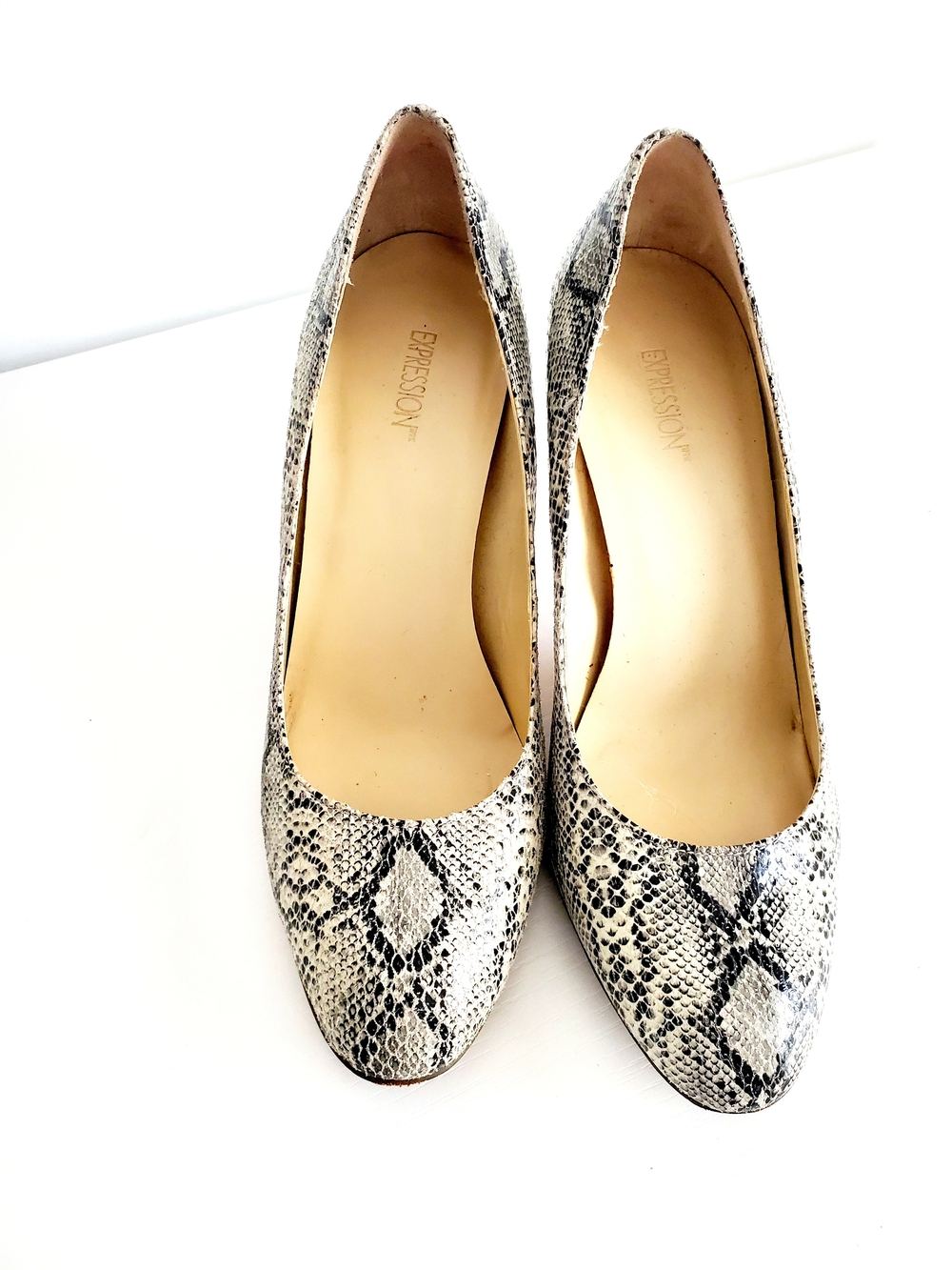 Expressions Women’s Snake-Print Pumps in Black and White